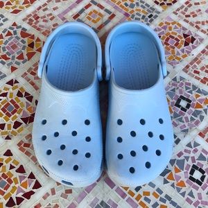 Light blue CROCS size S, womens 6-7, mens 4-5